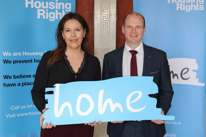 Communities Minister Gordon Lyons pictured with Housing Rights CEO Kate McCauley at Parliament Buildings. 