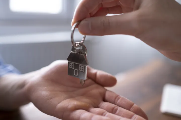 hand holding key