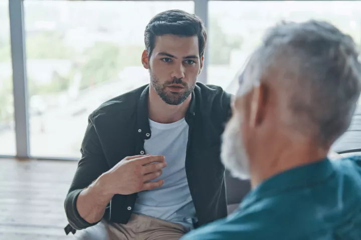 Two men talking