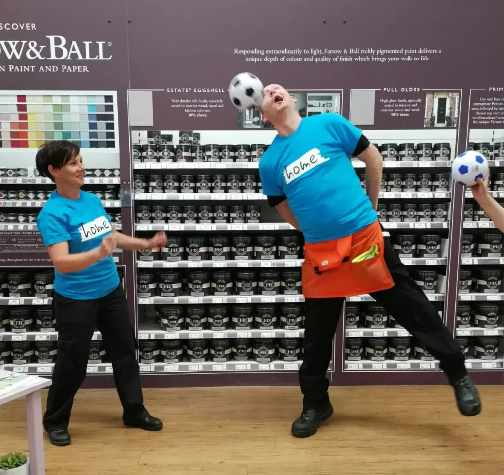B and Q staff doing World Cup themed fundraising for Housing Rights